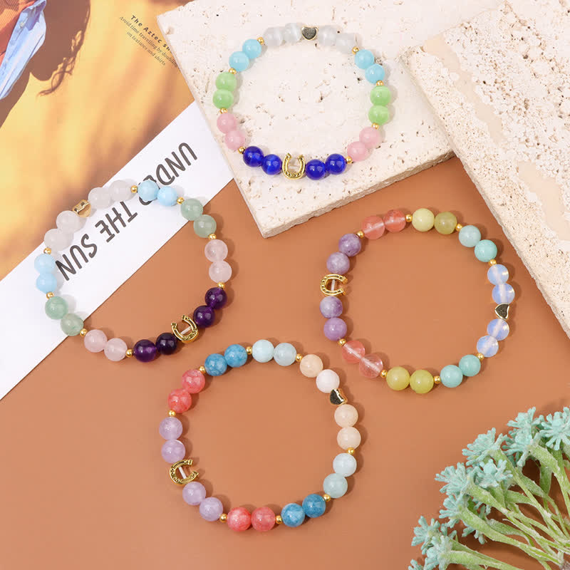 Braccialetto di perline con accessorio a forma di ferro di cavallo in metallo e pietra naturale Olivenorma 