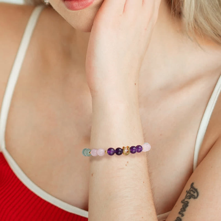 Braccialetto di perline con accessorio a forma di ferro di cavallo in metallo e pietra naturale Olivenorma 