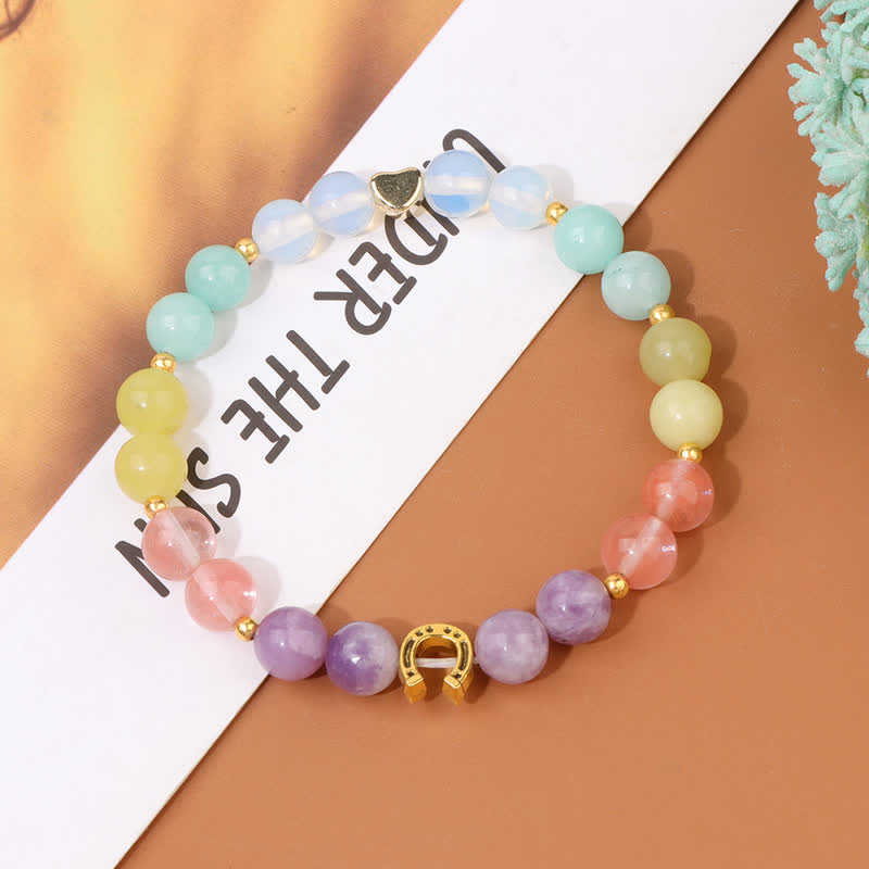 Braccialetto di perline con accessorio a forma di ferro di cavallo in metallo e pietra naturale Olivenorma 