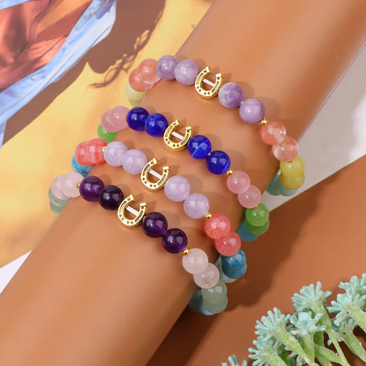 Braccialetto di perline con accessorio a forma di ferro di cavallo in metallo e pietra naturale Olivenorma 