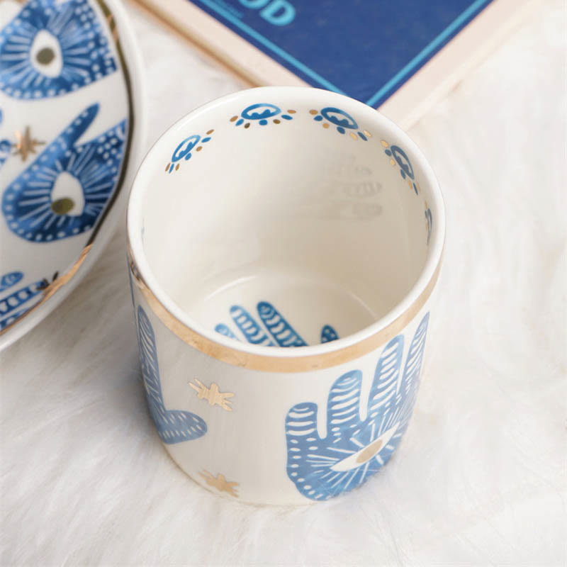 Tazza da tè in ceramica con mano di Hamsa e occhio malvagio Olivenorma