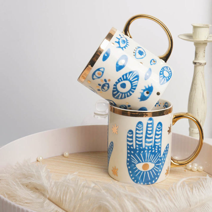 Tazza da tè in ceramica con mano di Hamsa e occhio malvagio Olivenorma