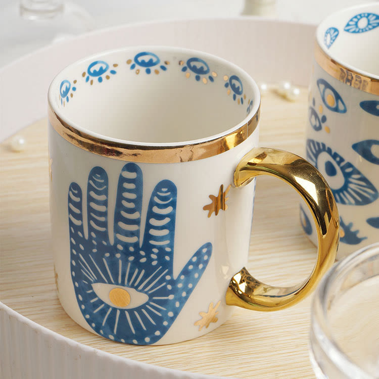 Tazza da tè in ceramica con mano di Hamsa e occhio malvagio Olivenorma