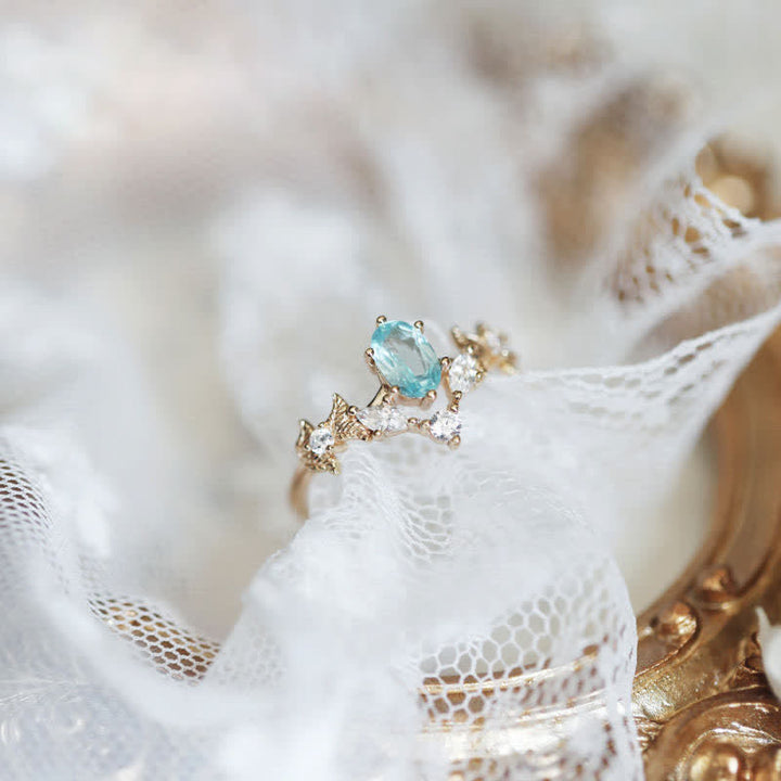 Anello Olivenorma a forma di corona con zirconi bianchi e acquamarina