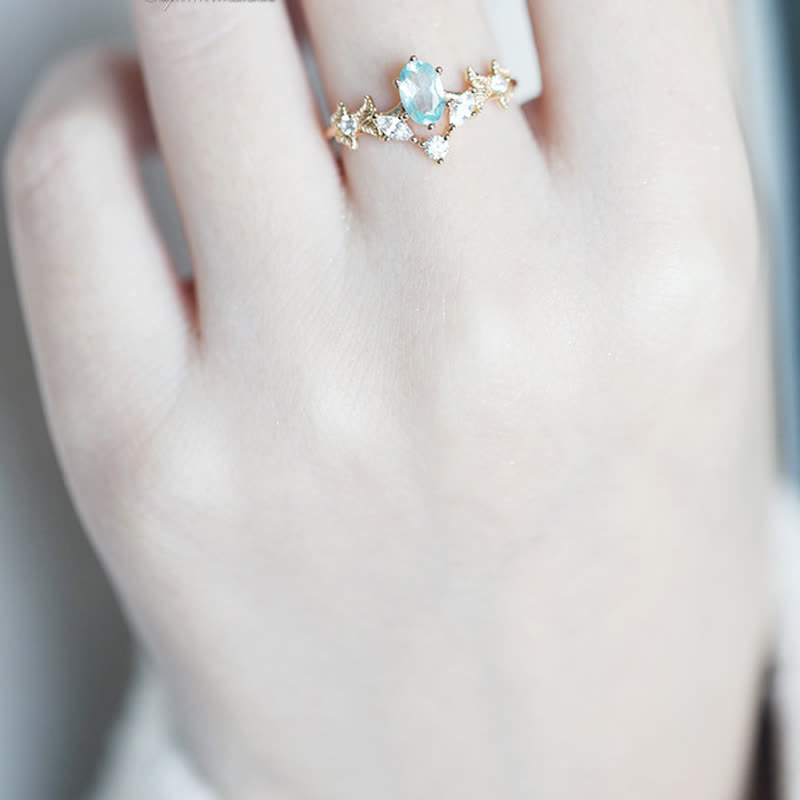 Anello Olivenorma a forma di corona con zirconi bianchi e acquamarina