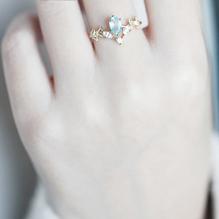 Anello Olivenorma a forma di corona con zirconi bianchi e acquamarina