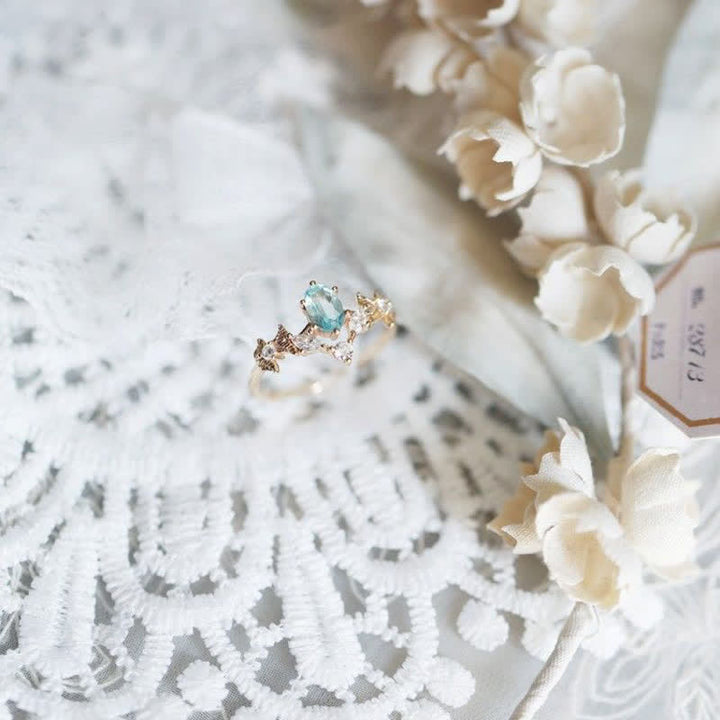 Anello Olivenorma a forma di corona con zirconi bianchi e acquamarina