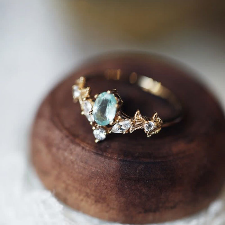 Anello Olivenorma a forma di corona con zirconi bianchi e acquamarina