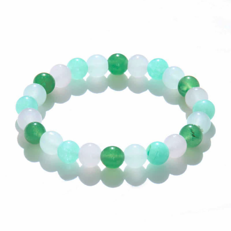 Bracciale Olivenorma con perline di quarzo rosa, fluorite verde e cristallo trasparente 
