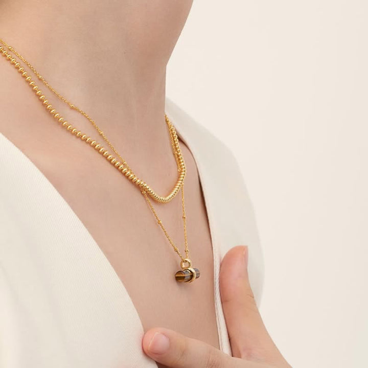 Collana con ciondolo in legno di bilanciamento con occhio di tigre naturale Olivenorma