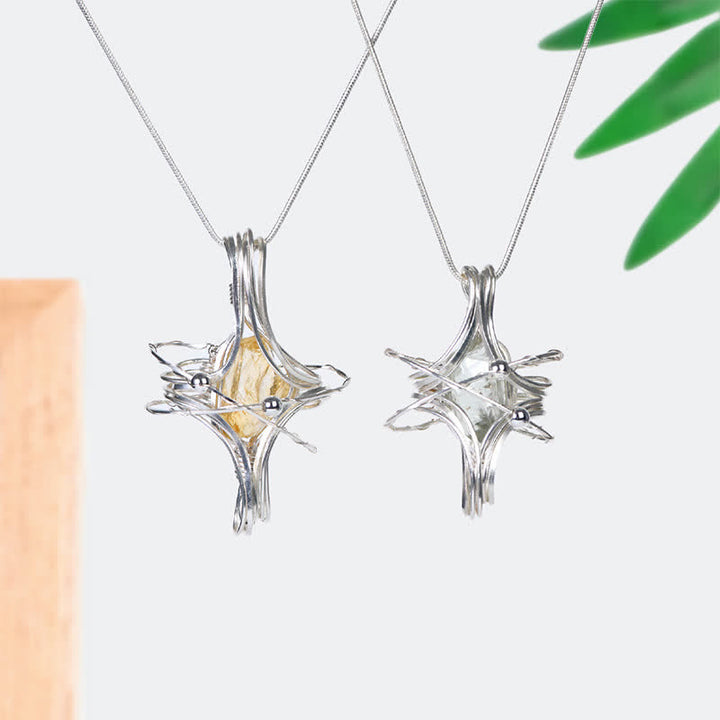 Collana con ciondolo pianeta ottaedrico a carica manuale in cristallo naturale Olivenorma