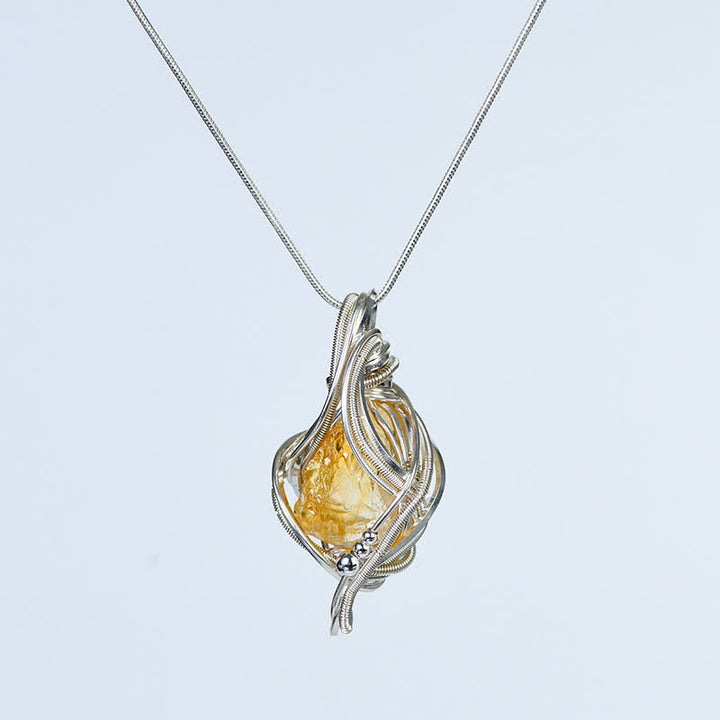 Collana con ciondolo in cristallo naturale avvolto "Generatore di energia" Olivenorma