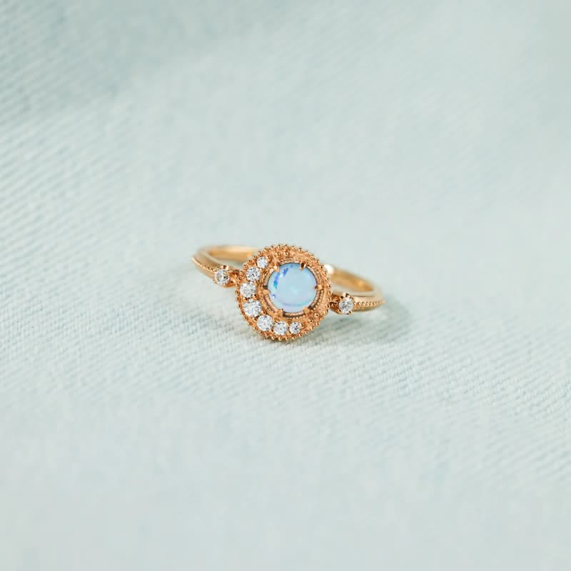 Anello Olivenorma con opale naturale e zircone bianco luna pianeta