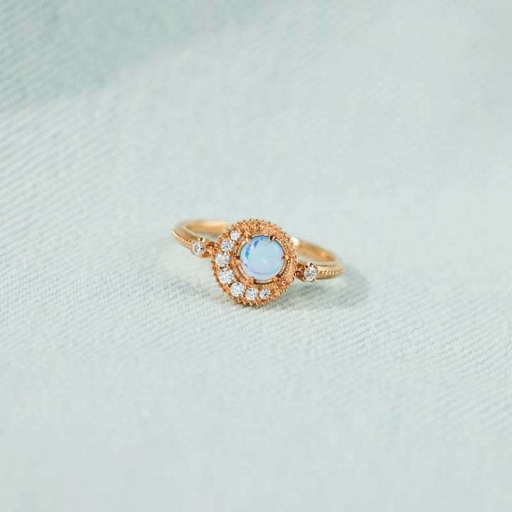 Anello Olivenorma con opale naturale e zircone bianco luna pianeta