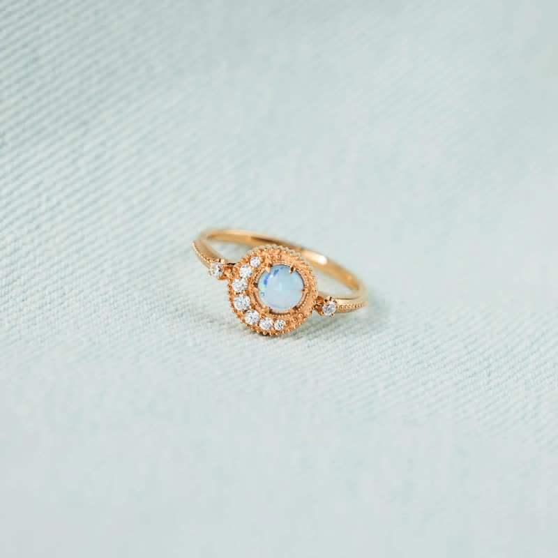 Anello Olivenorma con opale naturale e zircone bianco luna pianeta