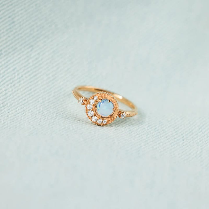 Anello Olivenorma con opale naturale e zircone bianco luna pianeta