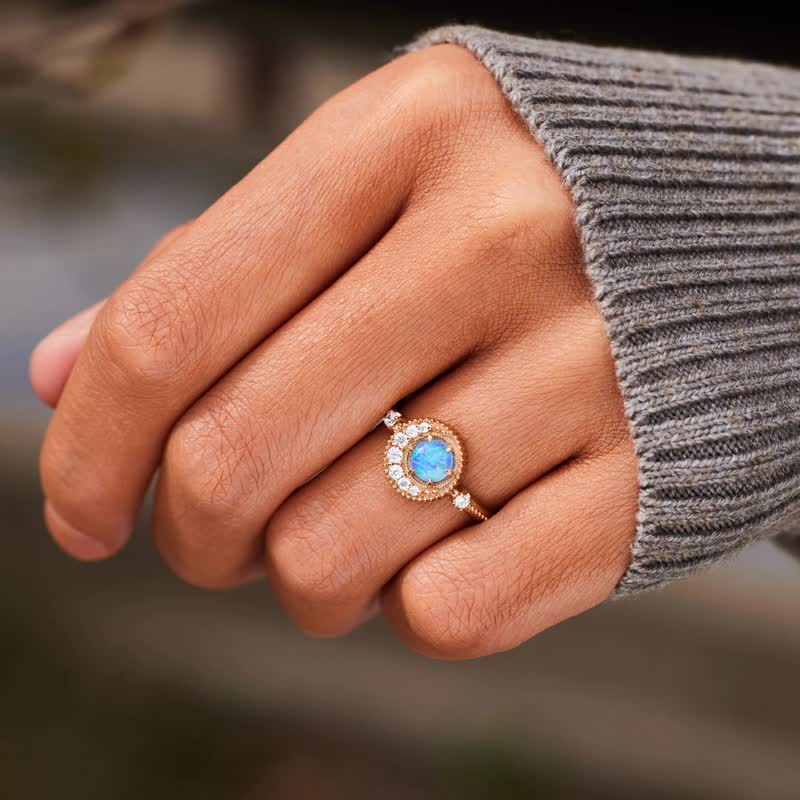Anello Olivenorma con opale naturale e zircone bianco luna pianeta