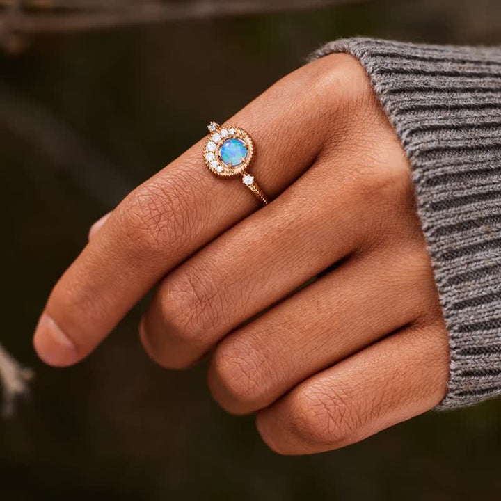 Anello Olivenorma con opale naturale e zircone bianco luna pianeta