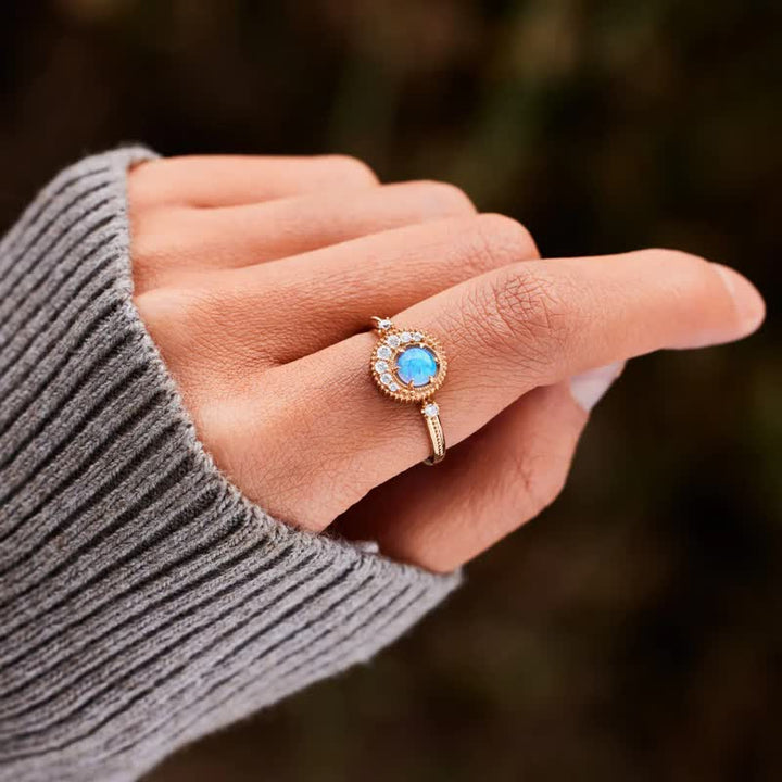 Anello Olivenorma con opale naturale e zircone bianco luna pianeta