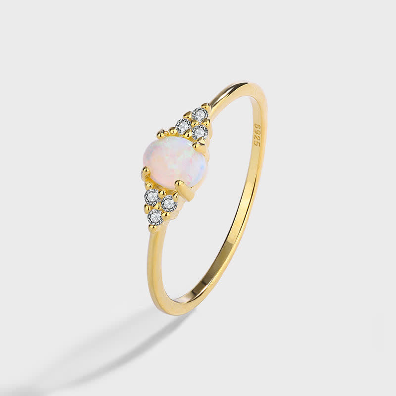 Anello Olivenorma in argento bianco con opale bianco e zircone semplice