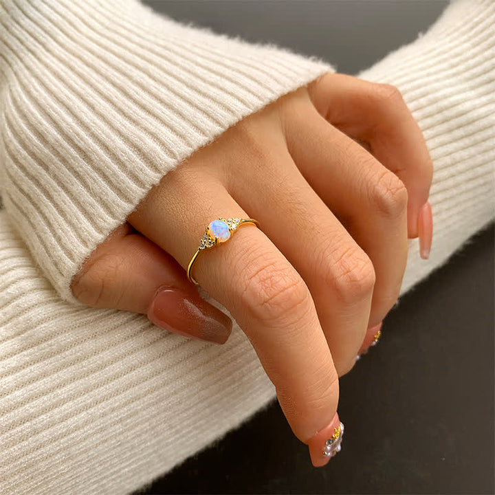 Anello Olivenorma in argento bianco con opale bianco e zircone semplice