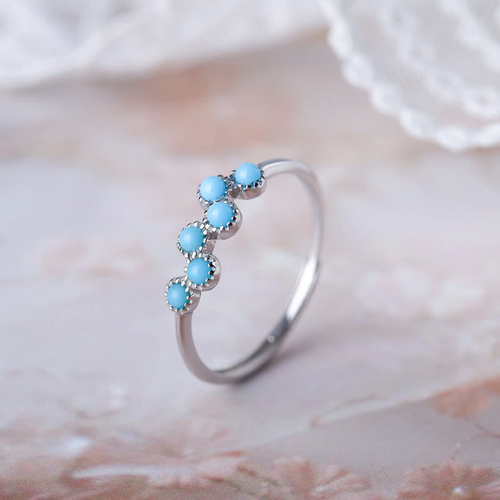 Olivenorma Anello creativo rotondo turchese a quattro griffe per coppia