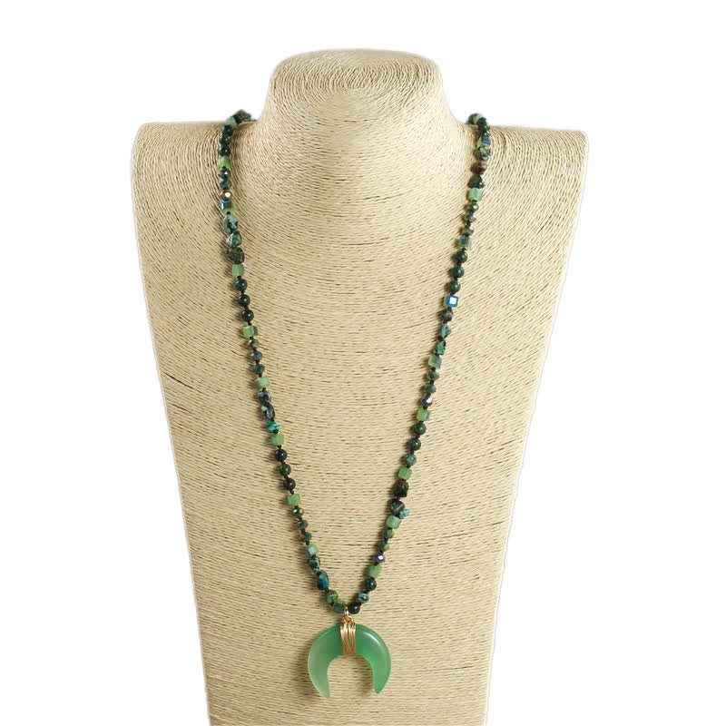 Collana con ciondolo a forma di mezzaluna in corno di bue con perline di cristallo naturale Olivenorma