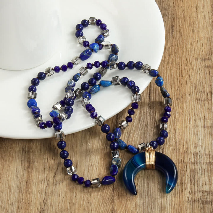 Collana con ciondolo a forma di mezzaluna in corno di bue con perline di cristallo naturale Olivenorma