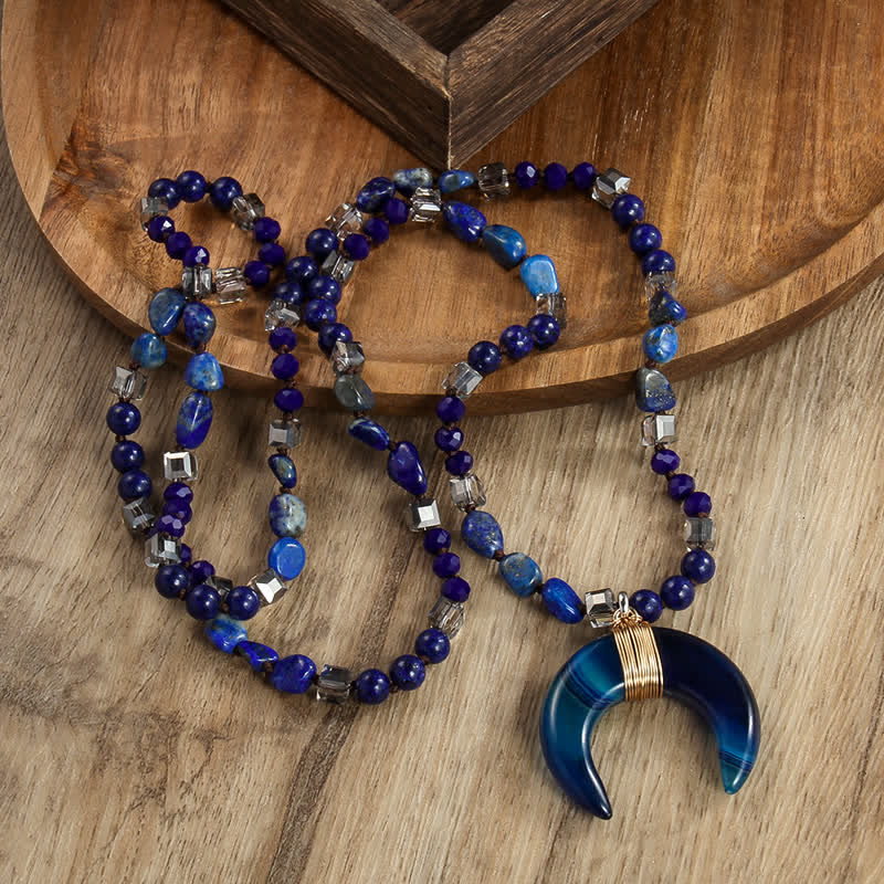 Collana con ciondolo a forma di mezzaluna in corno di bue con perline di cristallo naturale Olivenorma