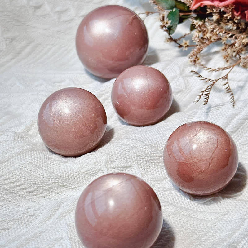 Sfera di cristallo di pietra di luna rosa naturale Olivenorma