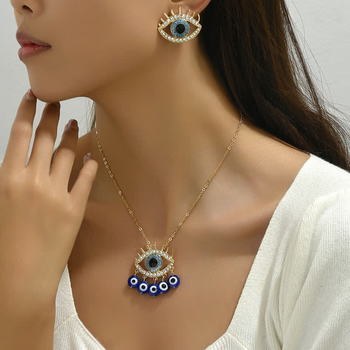 Gioielli con occhio maligno in zircone bianco e topazio blu Olivenorma