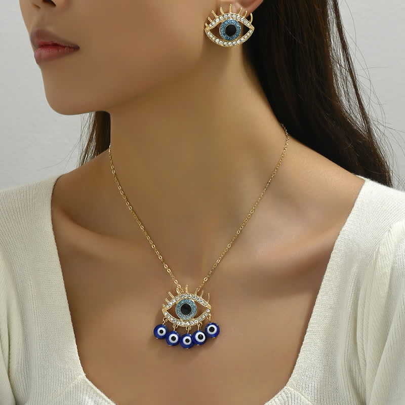 Gioielli con occhio maligno in zircone bianco e topazio blu Olivenorma