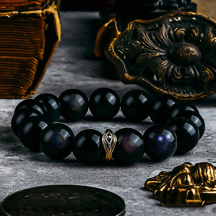 Braccialetto di perline con occhio maligno in ossidiana naturale color oro e argento Olivenorma