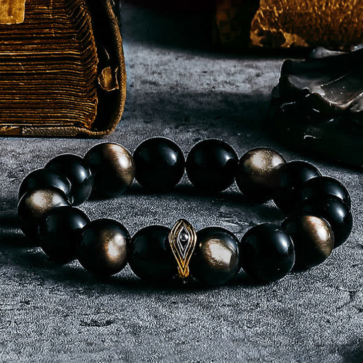 Braccialetto di perline con occhio maligno in ossidiana naturale color oro e argento Olivenorma