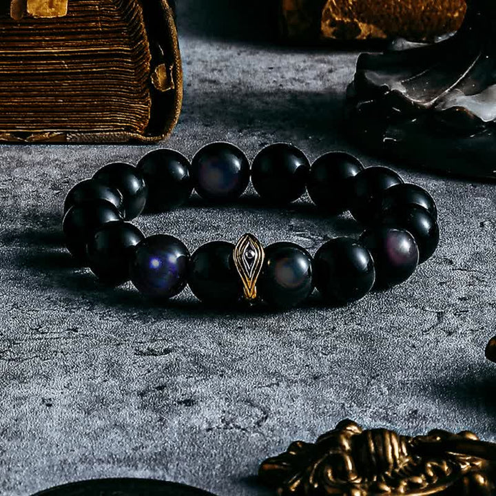 Braccialetto di perline con occhio maligno in ossidiana naturale color oro e argento Olivenorma