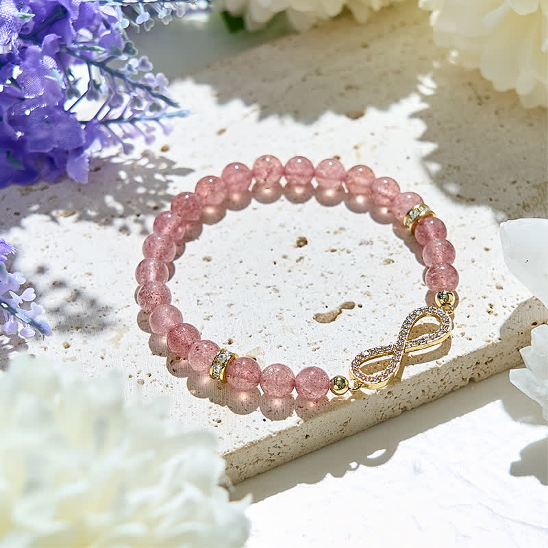 Bracciale con simbolo dell'infinito in perline di quarzo fragola naturale Olivenorma 