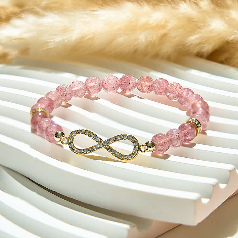 Bracciale con simbolo dell'infinito in perline di quarzo fragola naturale Olivenorma 