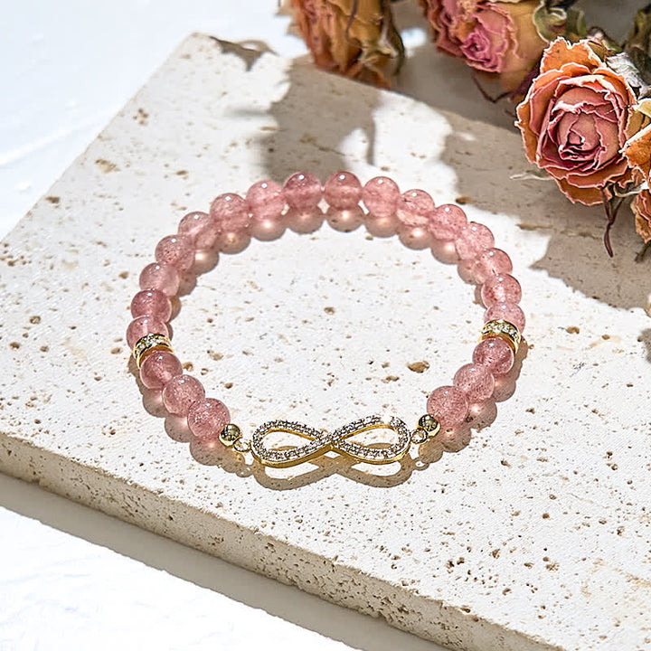 Bracciale con simbolo dell'infinito in perline di quarzo fragola naturale Olivenorma 