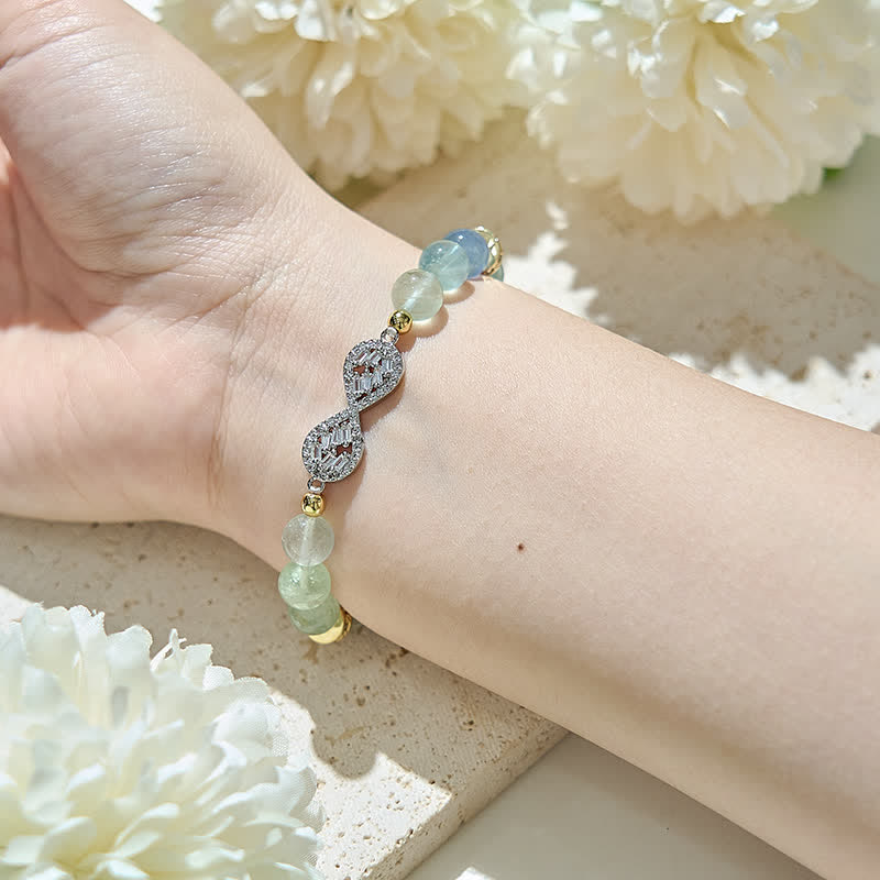 Bracciale con simbolo dell'infinito in perline di fluorite naturale Olivenorma