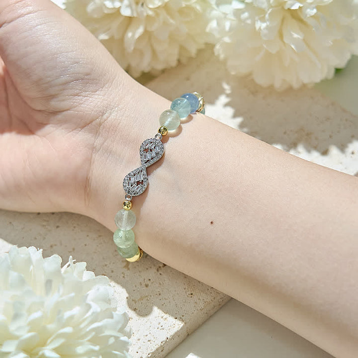 Bracciale con simbolo dell'infinito in perline di fluorite naturale Olivenorma