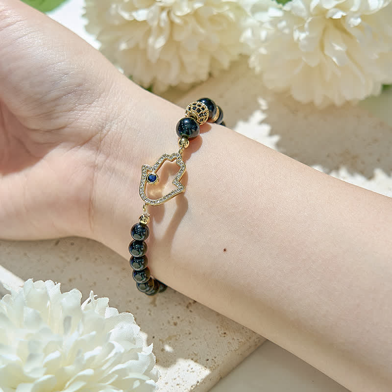 Olivenorma Bracciale con ciondolo Hamsa in perle di ossidiana naturale