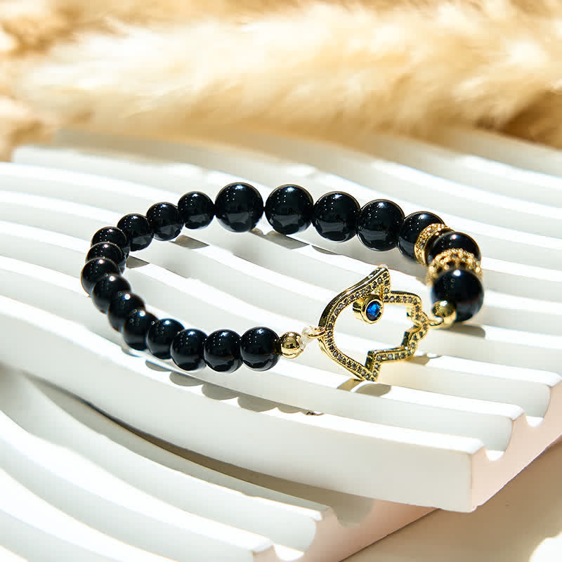Olivenorma Bracciale con ciondolo Hamsa in perle di ossidiana naturale