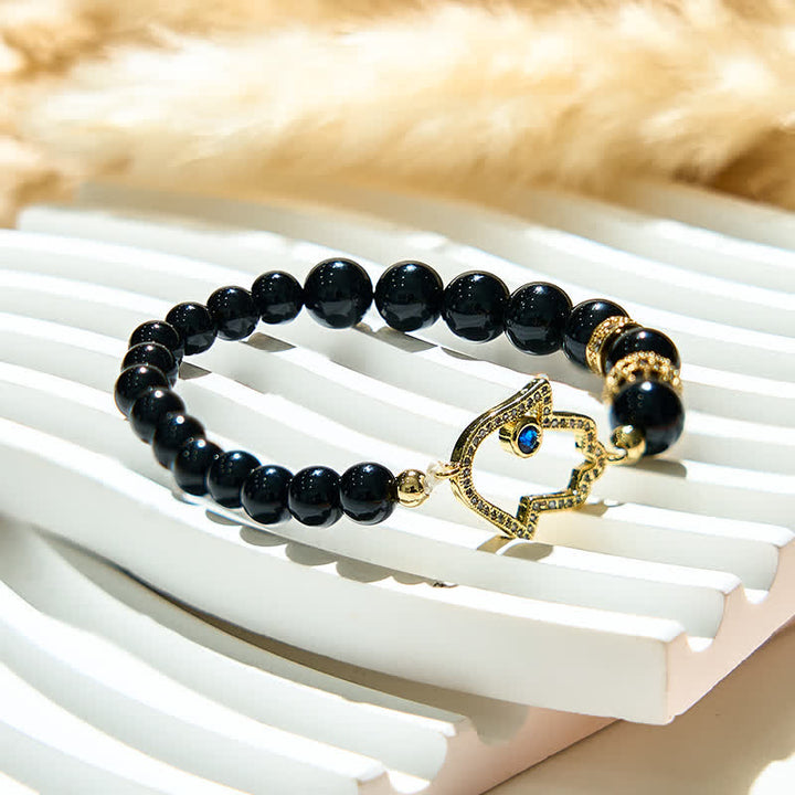 Olivenorma Bracciale con ciondolo Hamsa in perle di ossidiana naturale