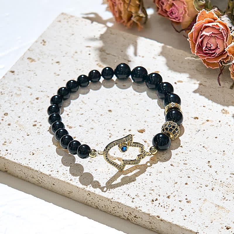 Olivenorma Bracciale con ciondolo Hamsa in perle di ossidiana naturale
