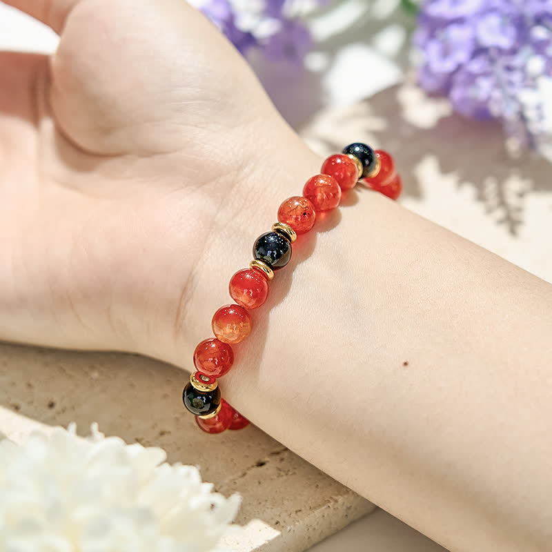 Bracciale Olivenorma con perline di onice nero e quarzo rubino naturale