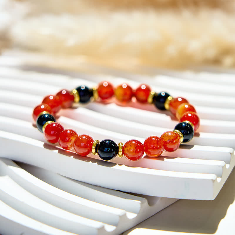 Bracciale Olivenorma con perline di onice nero e quarzo rubino naturale