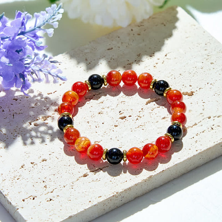 Bracciale Olivenorma con perline di onice nero e quarzo rubino naturale
