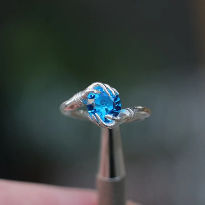 Olivenorma "Il segreto del cosmo" - Anello con pietra preziosa di cristallo