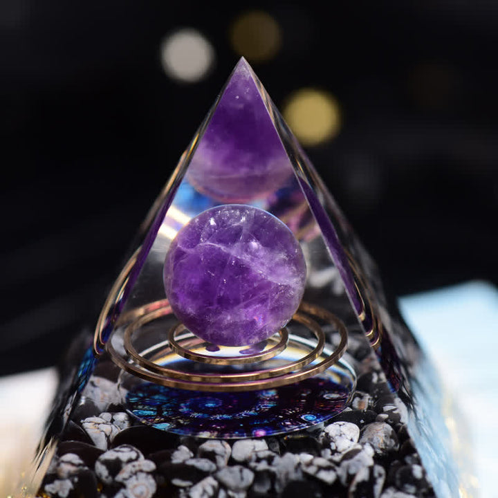 Piramide di Orgone con Palla di Ossidiana Fiocco di Neve e Ametista Olivenorma