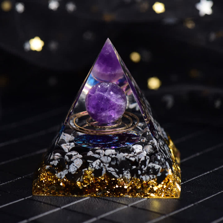 Piramide di Orgone con Palla di Ossidiana Fiocco di Neve e Ametista Olivenorma
